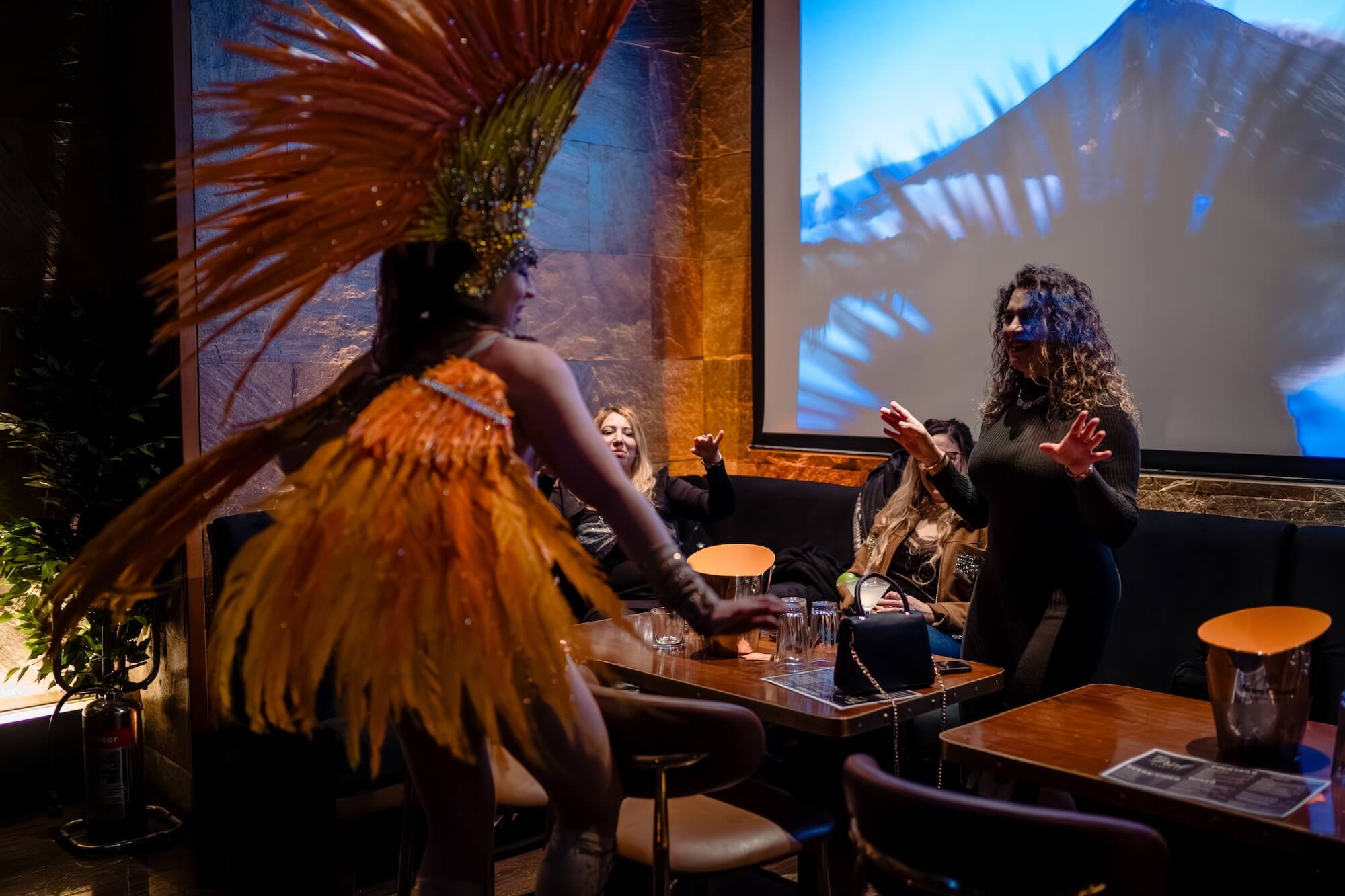 A live dance performance staged under warm, ambient lighting at the Purl Barbican private hire venue