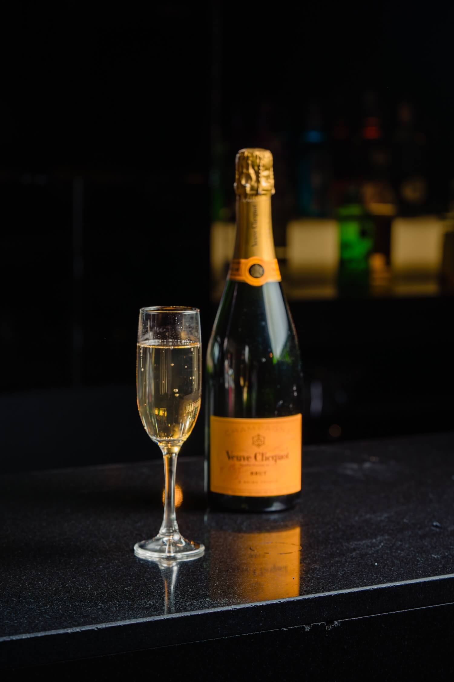 Chilled champagne and a filled flute set for a wedding celebration at PÚRL Barbican, London